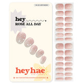 Heyhae: tiras gel semi-curado rose con glitter para un acabado glam.