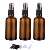 Juego de tres botellas de vidrio ámbar de 2oz para aceites esenciales y usos versátiles.