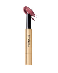 Hourglass Phantom Balm envase giratorio para aplicación limpia y precisa.