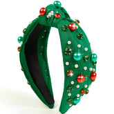 Diadema Huachi para Navidad con nudo, perlas y cristales que añade brillo festivo.