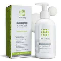 Humane 5% benzoyl peroxide face wash bottle highlights acne-prone skin benefits.