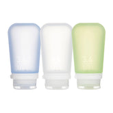 humangear GoToob+ 3-pack en colores claro, verde y azul, ideal para viajes cortos.