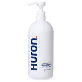 Champú Huron para hombre vertiendo en botella, limpieza rápida para empezar el día