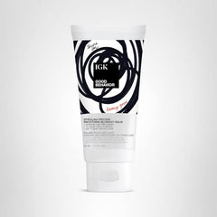 IGK GOOD BEHAVIOR Spirulina Protein Anti-Frizz Smoothing Blowout Balm aplicación con secador para alisar