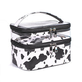 La bolsa imerelez con estampado de vaca y frente transparente para ver productos.