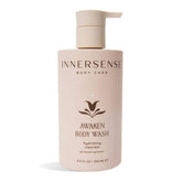 INNERSENSE Awaken Body Wash bottle showing avocado oil hydration for gentle cleansing