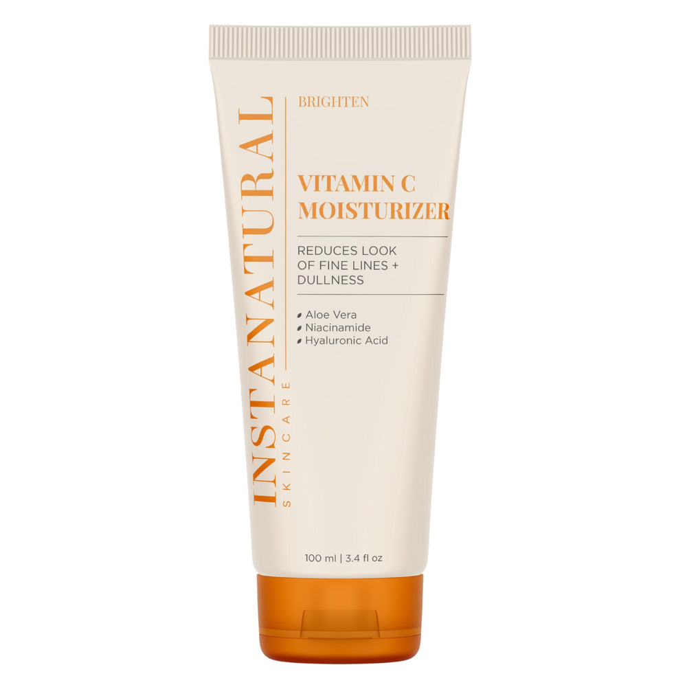 InstaNatural Vitamin C moisturizer bottle closeup for bright, hydrated skin.