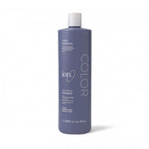 Ion Color Defense Champú: botella en detalle para cabello teñido con brillo saludable.