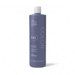 Ion Color Defense Champú: botella en detalle para cabello teñido con brillo saludable.