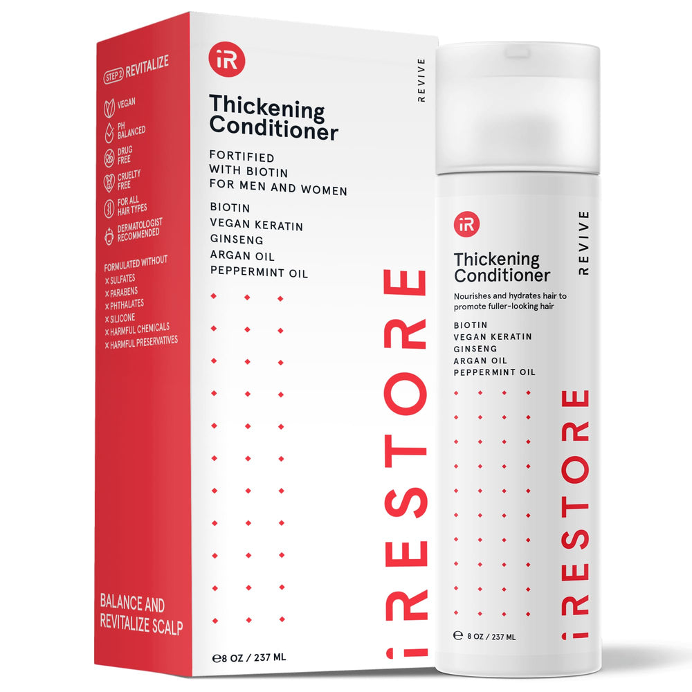 iRestore Biotin acondicionador para pelo dañado en botella, nutre y suaviza.
