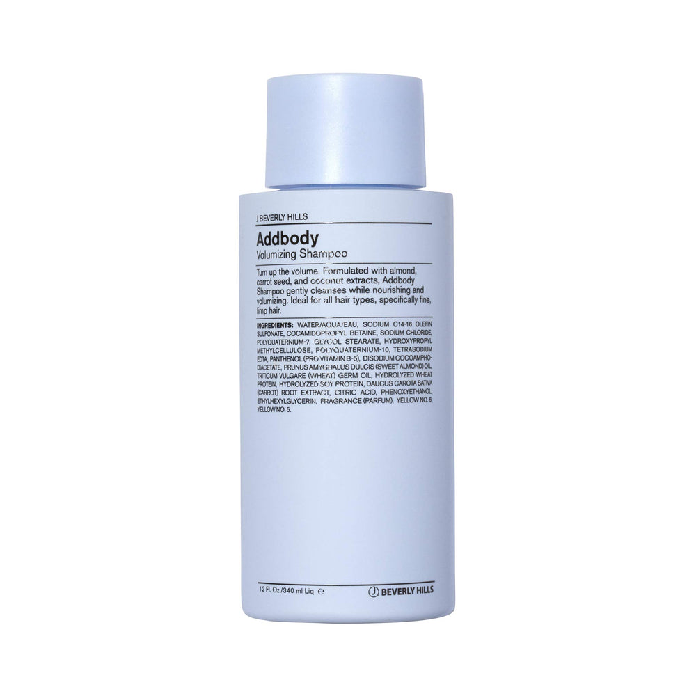 J Beverly Hills Addbody champú azul, botella visible, aporta volumen suave