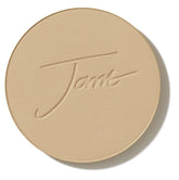 Jane Iredale Base mineral presionado dorado con acabado radiante para tono luminoso.
