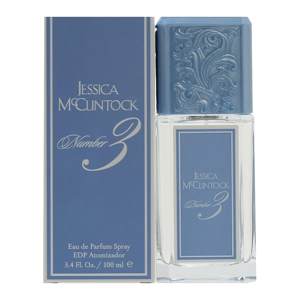 Jessica McClintock Numero Tres EDP en botella azul, fragancia elegante para ocasiones.