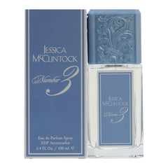 Jessica McClintock Numero Tres EDP en botella azul, fragancia elegante para ocasiones.