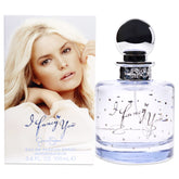I Fancy You de Jessica Simpson, botella de perfume, aroma elegante para ocasiones románticas.
