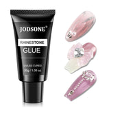 La botella Jodsone de 30 g adhesivo para fijar cristales en uñas.