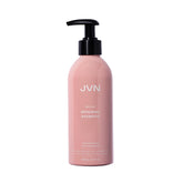 Botella de JVN Revive Reparador Champú mostrando su envase, ideal para cabello dañado.