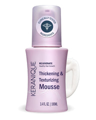 Keranique Volumizing Mousse bottle tilted for instant volume.