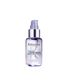 Kerastase Blond Absolu Serum, botella elegante para hidratación instantánea del cabello rubio.