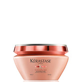 KÉRASTASE Discipline Mascarilla, envase elegante que sugiere cuidado restaurador para el cabello.