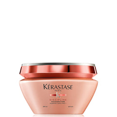 KÉRASTASE Discipline Mascarilla, envase elegante que sugiere cuidado restaurador para el cabello.