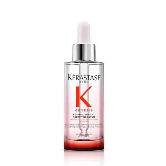 KÉRASTASE Genesis Serum: botella elegante para uso diario sin siliconas y fortalecimiento capilar.