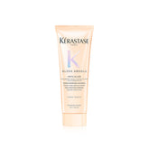 KÉRASTASE Gloss Absolu, botella derramando, brillo inmediato y desenredo suave