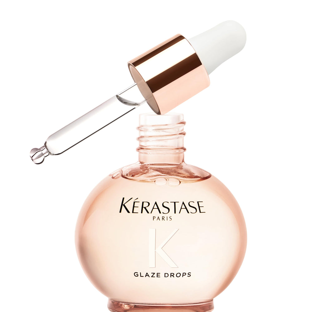 Kérastase Gloss Absolu Glaze Drops, botella elegante para brillo intenso sin grasa.