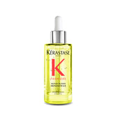 KÉRASTASE Première Aceite Reparador, botella para protección térmica y brillo duradero.