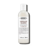 Botella de Kiehl's Amino Acid Shampoo limpia suave y revitaliza el cabello