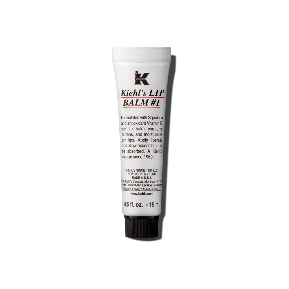 Kiehl's Bálsamo labial con envase claro, hidratación diaria para labios secos.
