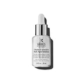 Kiehl's suero corrector de manchas en frasco promueve claridad y tono uniforme.