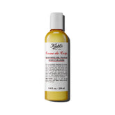 Bouteille Kiehl's Crème de Corps vanille-amande prête pour l'hydratation quotidienne.