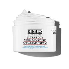 Kiehl's Ultra Body Barrier Repair Cream en bote, hidratación rápida.