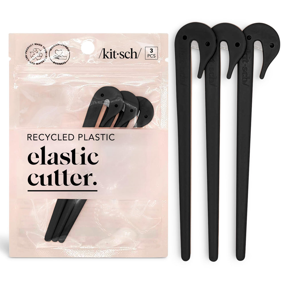 Kitsch Cortador de Gomas para Pelo en mano, uso cómodo y rápido.