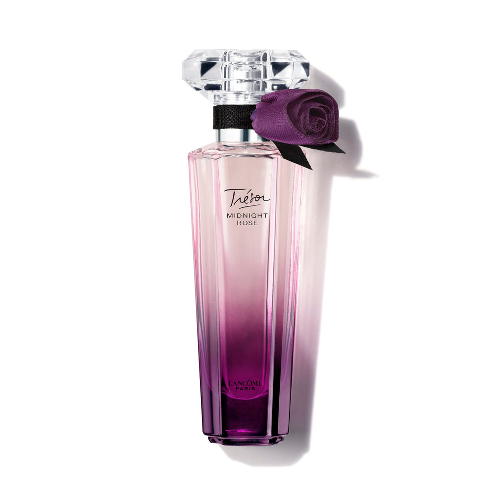 Lancôme Trésor Midnight presenta un frasco rosa, aroma elegante para ocasiones nocturnas.