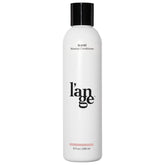 L'ANGE HAIR Slické, botella visible, brillo ligero sin peso.