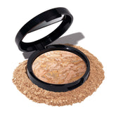 Laura Geller New York Balance-N-Glow base medio, compacto, acabado satinado suave para piel radiante.