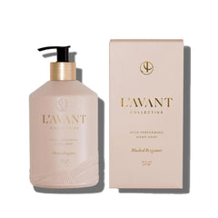 L'AVANT Collective botella de vidrio rosa para lavado de manos con fragancia.