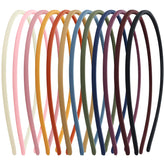 Diadema Lawie plástica delgada con dientes para peinados firmes.
