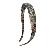 Diadema Layongmoli acetato azul marmol; estilo audaz y duradera para peinados.