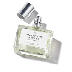 Caja regalo Pistachio Brûlée Le Monde Gourmand, experiencia de apertura premium.