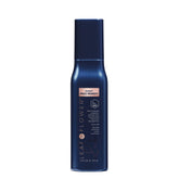 Leaf & Flower Remède Instant Antifrizz, bouteille en action: combat l'humidité et démêle les cheveux.