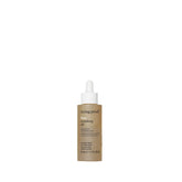 Living Proof No Frizz Vanishing Oil, botella en mano para control del frizz.