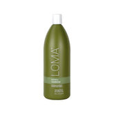 Loma Nourishing Conditioner, botella de 33 oz, revitaliza cabello seco.