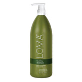 Shampoing nourrissant Loma en bouteille, hydrate intensément les cheveux.