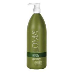 Shampoing nourrissant Loma en bouteille, hydrate intensément les cheveux.