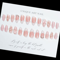 Uñas LPOODDNU con lazo 3D y diamantes para un look elegante.