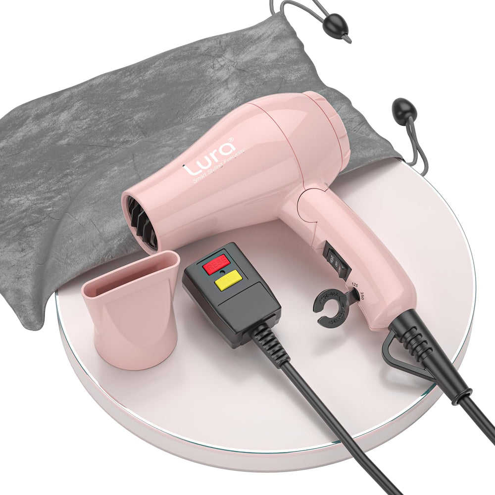 Secador LURA de viaje plegable en rosa con estuche, ideal para viajar ligero.