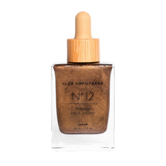 Lux Unfiltered N°12 Sunstruck: botella bronceadora facial mostrando tono en desarrollo